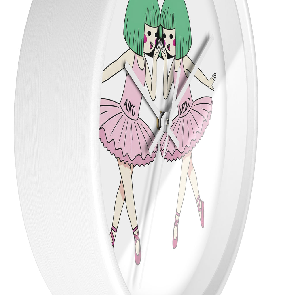 Aiko and Keiko dancing ballerina anime girls wall clock with pink tutus and green hair illustration.